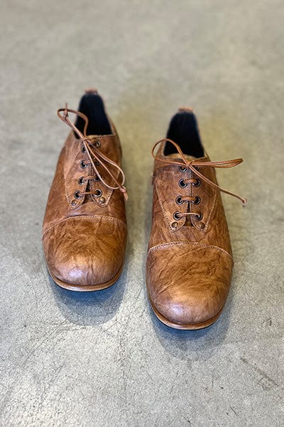 Classic-W | Wrinkled Cognac – biography
