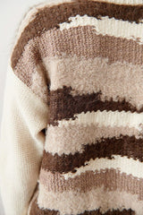 Wol Hide knit weave sweater in brown, beige, and cream strata color